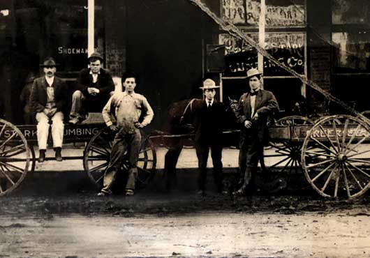 Early plumbers for Coleman Plumbing & Heating Co., then called Greer & Stark Plumbing, are pictured with the company’s wagon. When the business began, horse and wagon was still the main mode of transportation. 
